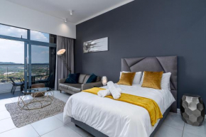 Top Floor Menlyn Maine studio apartment with Stunning Views & No Load Shedding